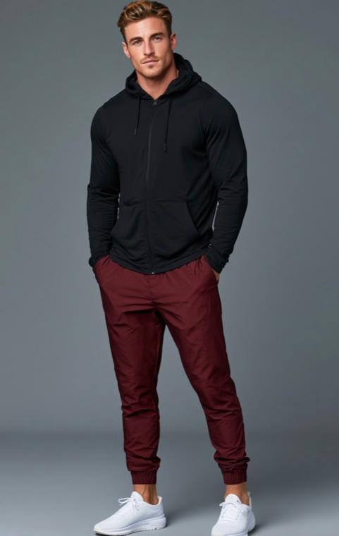 The product photo this sample model was generated from: a man in a black zip hoodie and burgundy joggers.